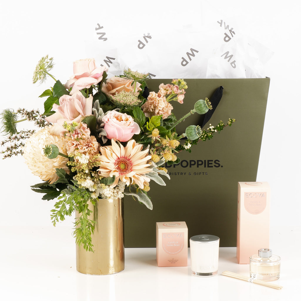 "Vanilla Bean Gift Set" showcasing a fresh pastel posy paired with Ecoya’s Vanilla Bean candle and diffuser. Wrapped in a premium Wild Poppies gift bag with satin ribbon, this set provides a calming and fragrant indulgence for the senses.